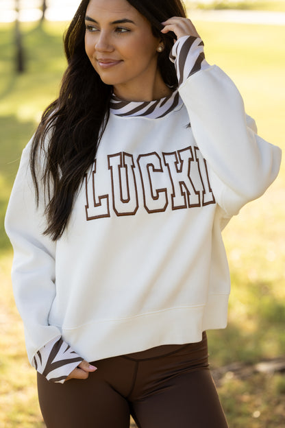 Embroidered Zebra Mockneck